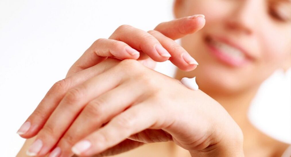application of hand cream for skin rejuvenation